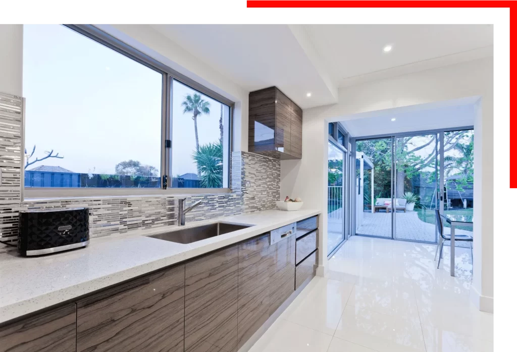 Open plan kitchen with a garden view